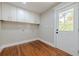 Laundry room featuring clean lines, white paint and ample storage at 4446 Huntington Cir, Atlanta, GA 30338