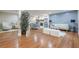 Open-concept living room with hardwood floors, stylish furniture, and a custom accent wall at 4446 Huntington Cir, Atlanta, GA 30338