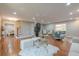 Spacious living area with hardwood floors, ample seating, and great natural light at 4446 Huntington Cir, Atlanta, GA 30338