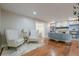 Cozy living area with hardwood floors, built-in shelving, and ample seating at 4446 Huntington Cir, Atlanta, GA 30338