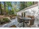 Outdoor patio features stylish seating and dining areas, perfect for gatherings and summer enjoyment at 4446 Huntington Cir, Atlanta, GA 30338