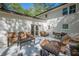 Outdoor patio featuring seating areas and access to the home's interior at 4446 Huntington Cir, Atlanta, GA 30338