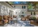 Patio area with multiple seating groups is great for relaxing with Gathering and friends at 4446 Huntington Cir, Atlanta, GA 30338