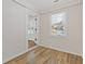 Office space featuring wood-look floors, natural light and fresh paint at 1824 Westwood Sw Ave, Atlanta, GA 30310