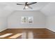 Spacious bedroom with hardwood floors, vaulted ceiling, and double windows at 1824 Westwood Sw Ave, Atlanta, GA 30310