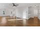 Open floorplan shows refinished hardwood floors and fresh paint throughout at 1824 Westwood Sw Ave, Atlanta, GA 30310