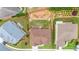 Aerial view of a fenced backyard with a manicured lawn and garden bed at 3652 Terrah Point Dr, Duluth, GA 30097