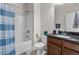 Clean bathroom with a shower-tub combination and granite vanity at 3652 Terrah Point Dr, Duluth, GA 30097