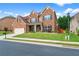 Charming two-story brick home with well-manicured lawn and a two-car garage at 3652 Terrah Point Dr, Duluth, GA 30097