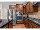 Gourmet kitchen with stainless steel appliances and granite countertops at 3652 Terrah Point Dr, Duluth, GA 30097