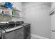 Convenient laundry room with modern washer and dryer units at 3652 Terrah Point Dr, Duluth, GA 30097