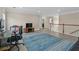 Spacious living room featuring hardwood floors and a stylish area rug at 3652 Terrah Point Dr, Duluth, GA 30097