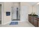 This luxurious main bathroom features a marble shower and dual vanity at 3652 Terrah Point Dr, Duluth, GA 30097