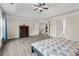 A spacious main bedroom boasts a tray ceiling and views into the hallway and stairway at 3652 Terrah Point Dr, Duluth, GA 30097