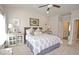 Bedroom with vaulted ceiling features carpet, overhead fan, and ample natural light at 4000 Chastain Preserve Ne Way, Atlanta, GA 30342