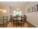 Classic dining room featuring a decorative chandelier and modern decor at 4000 Chastain Preserve Ne Way, Atlanta, GA 30342