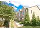 Charming townhome exterior with well-maintained landscaping and a beautiful brick facade at 4000 Chastain Preserve Ne Way, Atlanta, GA 30342