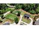 Stunning aerial view showcasing the community garden, dog park, and walking trails at 408 Townly Ct, Alpharetta, GA 30009