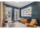 Office space with lots of natural light, neutral rug, wooden desk, and a cozy leather chair at 408 Townly Ct, Alpharetta, GA 30009