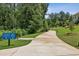 Enjoy a serene walk through the community on this scenic paved trail surrounded by greenery at 408 Townly Ct, Alpharetta, GA 30009