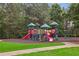 Community playground with colorful play structures and ample space for enjoyment at 147 Longleaf Dr, Canton, GA 30114