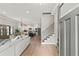 Bright and open foyer leading to a spacious living area, dining area, and a modern kitchen with stainless appliances at 1521 Sylvan Sw Rd, Atlanta, GA 30310