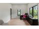 Bright home office with a sleek desk, a comfortable chair, and large windows offering natural light at 1521 Sylvan Sw Rd, Atlanta, GA 30310