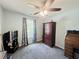 Bedroom features large window, hardwood furniture, and blue walls at 33 Bo Xing, Temple, GA 30179
