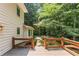 Inviting back deck overlooking a lush, wooded backyard at 5240 Arrie Way, Atlanta, GA 30360