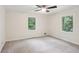 Spacious bedroom bathed in natural light from its two large windows at 5240 Arrie Way, Atlanta, GA 30360