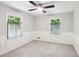 Bedroom with wainscoting, neutral walls, and carpet flooring at 5240 Arrie Way, Atlanta, GA 30360