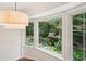 Bright breakfast nook featuring a large bay window looking out on greenery at 5240 Arrie Way, Atlanta, GA 30360