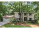 Charming two-story home with beautiful landscaping and a two-car garage at 5240 Arrie Way, Atlanta, GA 30360