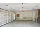 Well-lit garage space with built-in shelving units and workbench at 5240 Arrie Way, Atlanta, GA 30360
