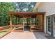 Spacious screened porch with views of the wooded backyard at 5240 Arrie Way, Atlanta, GA 30360