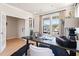 Bright office area with large windows, a modern desk, and neutral decor at 102 Sheryl Way, Loganville, GA 30052