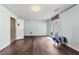 Finished basement with modern flooring, double doors to the outside, and neutral paint at 3485 Palisade Lake Dr, Duluth, GA 30096