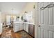 Cozy kitchen featuring white cabinets, stainless steel appliances, and a bright, airy atmosphere at 3485 Palisade Lake Dr, Duluth, GA 30096
