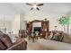 Cozy living room featuring comfortable seating, a decorative entertainment center, and natural light at 3485 Palisade Lake Dr, Duluth, GA 30096
