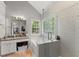 Bright bathroom with tiled shower, separate tub, and granite countertops at 5510 Pilgrim Point Ext, Cumming, GA 30041