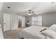 Bedroom featuring carpet floors, a bed, fan and natural light at 5510 Pilgrim Point Ext, Cumming, GA 30041