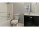 Full bathroom with shower-tub combo, a classic vanity, and neutral tones at 2139 Jonathan Ave, Lithonia, GA 30058