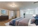 Serene bedroom with comfortable bed, natural light, and stylish decor at 2139 Jonathan Ave, Lithonia, GA 30058