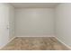Simple bedroom featuring neutral carpeting, fresh paint, and a closet at 2139 Jonathan Ave, Lithonia, GA 30058