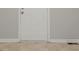 A plain white door that gives access to the house at 2139 Jonathan Ave, Lithonia, GA 30058