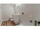 A utility sink with vinyl flooring in a room with washer and dryer hookups at 2139 Jonathan Ave, Lithonia, GA 30058