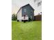 Home's exterior showing backyard and rear entry at 2650 Batavia St, East Point, GA 30344