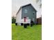 Home's exterior showing backyard and rear entry with small porch at 2650 Batavia St, East Point, GA 30344