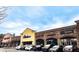 A wide array of storefronts with prominent signage and architectural details at 2650 Batavia St, East Point, GA 30344