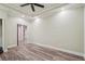 Spacious bedroom with tray ceiling, and wood-look floors at 3850 Stepney Way, Cumming, GA 30041